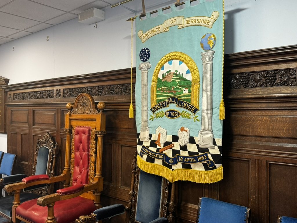 The Ashley Hill Lodge banner hanging beside the Master's chair in the lodge room